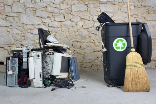 A skip placed on a residential driveway in Chingford with proper signage.